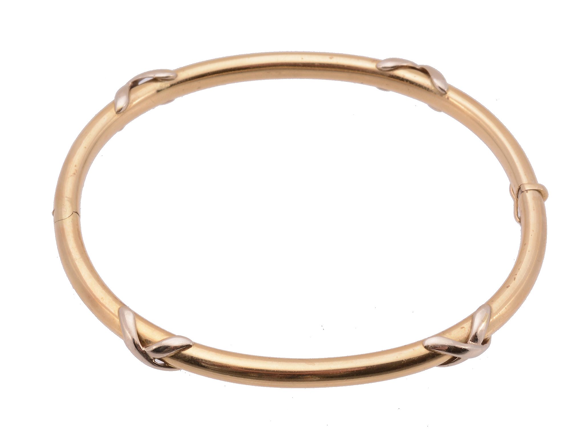 An 18 carat gold hinged bangle, the polished bangle with applied cross motifs, with a London - Image 2 of 2