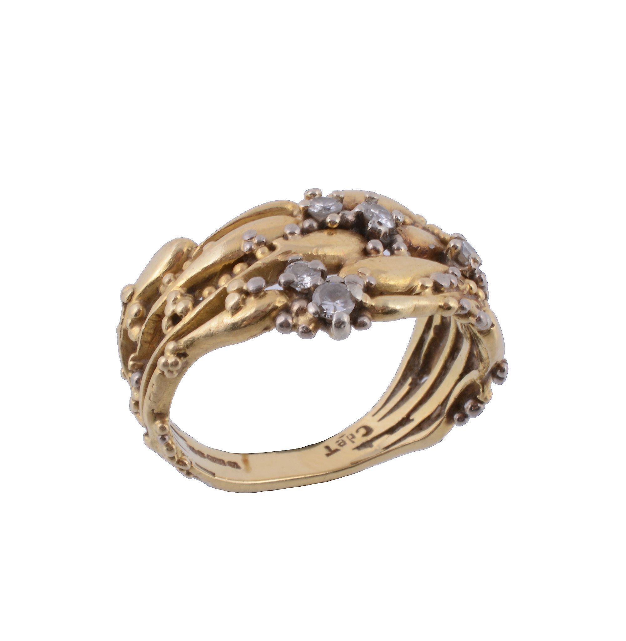 An 18 carat gold and diamond ring by Charles de Temple, the band with beaded detail, set with