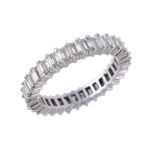 A diamond eternity ring , the ring set with baguette cut diamonds, approximately 0.96 carats total,