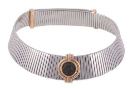 A tubo gaz and coin necklace by Bulgari, designed as a two colour, wide coiled adjustable band