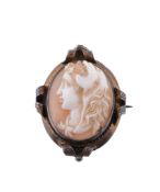 A shell cameo brooch, carved with the profile of Hercules wearing the Nemean lion pelt, within a