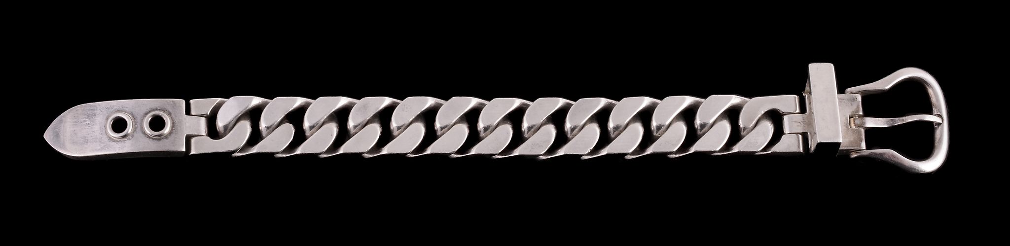 A silver bracelet by Hermes, composed of polished curb links, to a buckle style clasp, signed