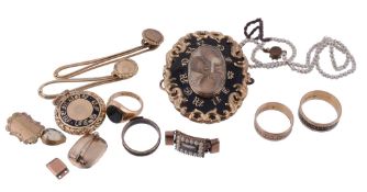 A collection of mourning jewellery and other items, including: a late 18th century gold and enamel