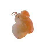 A jadeite jade monkey and gourd pendant, carved as a monkey clasping a gourd, with a pendant
