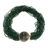 An adventurine quartz and nephrite necklace , the polished adventurine quartz beads to a pierced