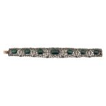 A green tourmaline and diamond bracelet, the graduated pierced floral panels set with lasque cut