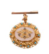 A 19th Century chalcedony and turquoise brooch/pendant, the oval shaped chalcedony centred with an