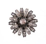 A diamond flower head brooch, the flower head set throughout with rose cut diamonds, 3.4cm long