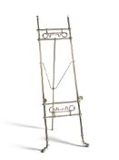 A 19th Century Brass Easel England circa 1890,  the body with two fielded areas containing