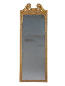 A Queen Anne Carved Giltwood Pier Glass England circa 1710, retaining the original plates, the lower
