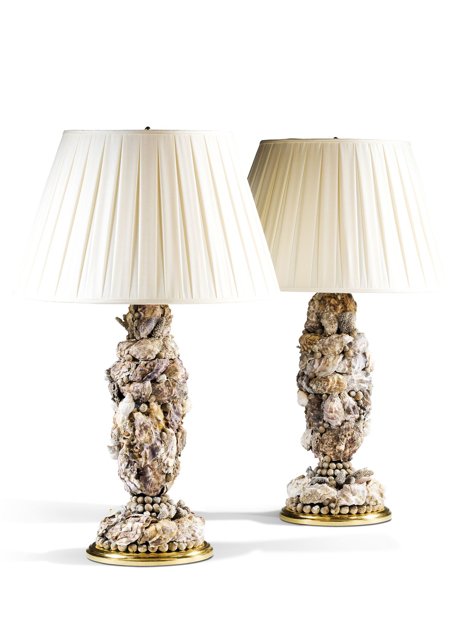 A Pair of Shell Lamps By Tessa Morley England circa 2010, covered with oysters, molluscs and