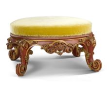 A Rococo Revival Oval Footstool England circa 1840, richly carved with gilt foliate decoration set