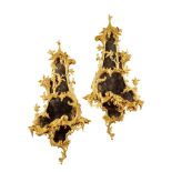 A Pair of Carved Rococo Giltwood Girandoles England circa 1760, of large size, retaining their