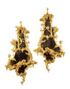 A Pair of Carved Rococo Giltwood Girandoles England circa 1760, of large size, retaining their