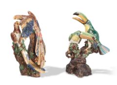 A Pair of Majolica Bird Groups Germany circa 1890, of toucans and parrots sculpted in tin-glazed