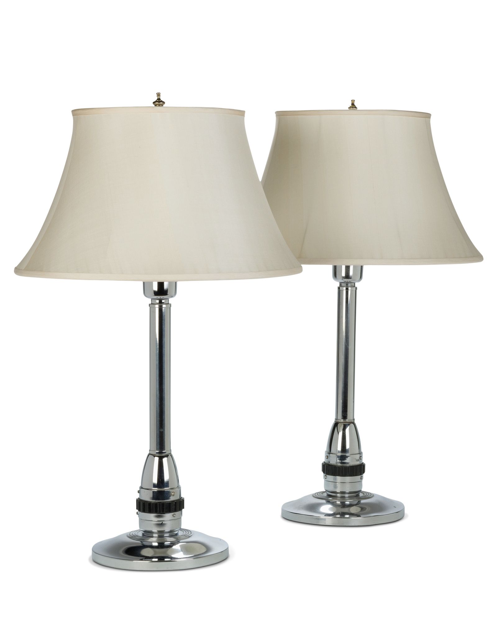 A Pair of Art-Deco Chrome Table Lamps France circa 1940, with a bakelite collar at the base