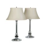 A Pair of Art-Deco Chrome Table Lamps France circa 1940, with a bakelite collar at the base