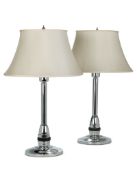 A Pair of Art-Deco Chrome Table Lamps France circa 1940, with a bakelite collar at the base