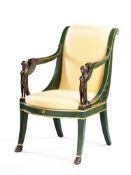 An Empire Parcel Gilt Fauteuil France circa 1810, the arms fashioned as sphinxes, the scroll backs