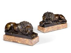 A Pair of Bronze Canova Lions Italy circa 1820, models of the waking and sleeping lion taken from