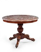 A Charles X Gueridon France circa 1835, retaining its original  G ris St Anne marble top with