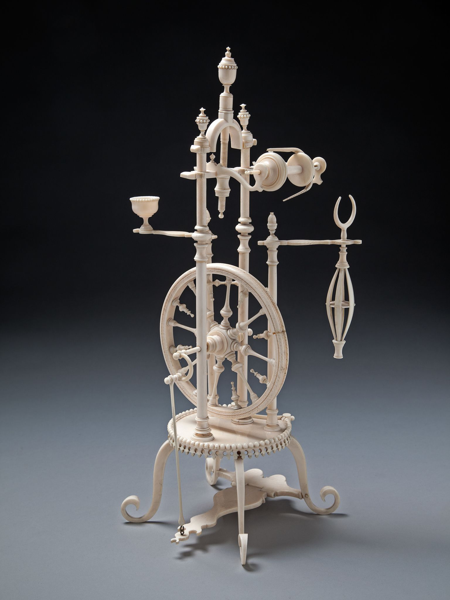 A Carved Ivory Model of A Spinning Wheel France circa 1890, entirely conceived in Dieppe ivory, - Image 2 of 2