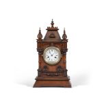 A Gothic Clock England / France circa 1860, in the form of a  G othic castle facade with a mansard