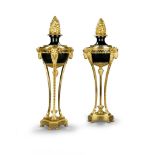 A Pair of Gilt Bronze Atheniennes Sweden circa 1820, the bronze patinated tô le covers are