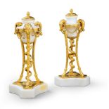 A Pair of White Marble and Gilt Bronze Cassolettes France circa 1785, in the form of atheniennes,