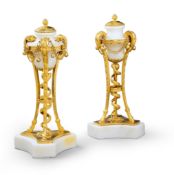 A Pair of White Marble and Gilt Bronze Cassolettes France circa 1785, in the form of atheniennes,