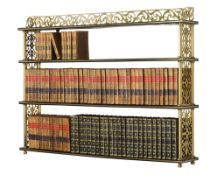 A Pair of William IV Brass and Ebonised Wood Hanging Shelves England circa 1830, each tier is strung