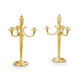 A Pair of Empire Gilt Bronze Candelabra France circa 1810, the central stem is decorated in low