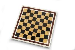 A Marble Chess Board Italy circa 1860, the squares are in black and sienna marbles and framed in