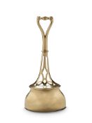 A 19th Century Brass Dooorstop England circa 1860, in the form of a bell with an inverted scroll