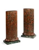 A Pair of Scagliola Pedestals Italy circa 1800, each of oval form fashioned from simulated griotte