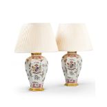 A Pair of Samson "Famille Rose" Armorial Vases Mounted as Lamps France circa 1870, the front face