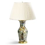 A Decalcomania Vase Mounted as a Lamp France circa 1850, decorated with polychrome chinoiseries on a