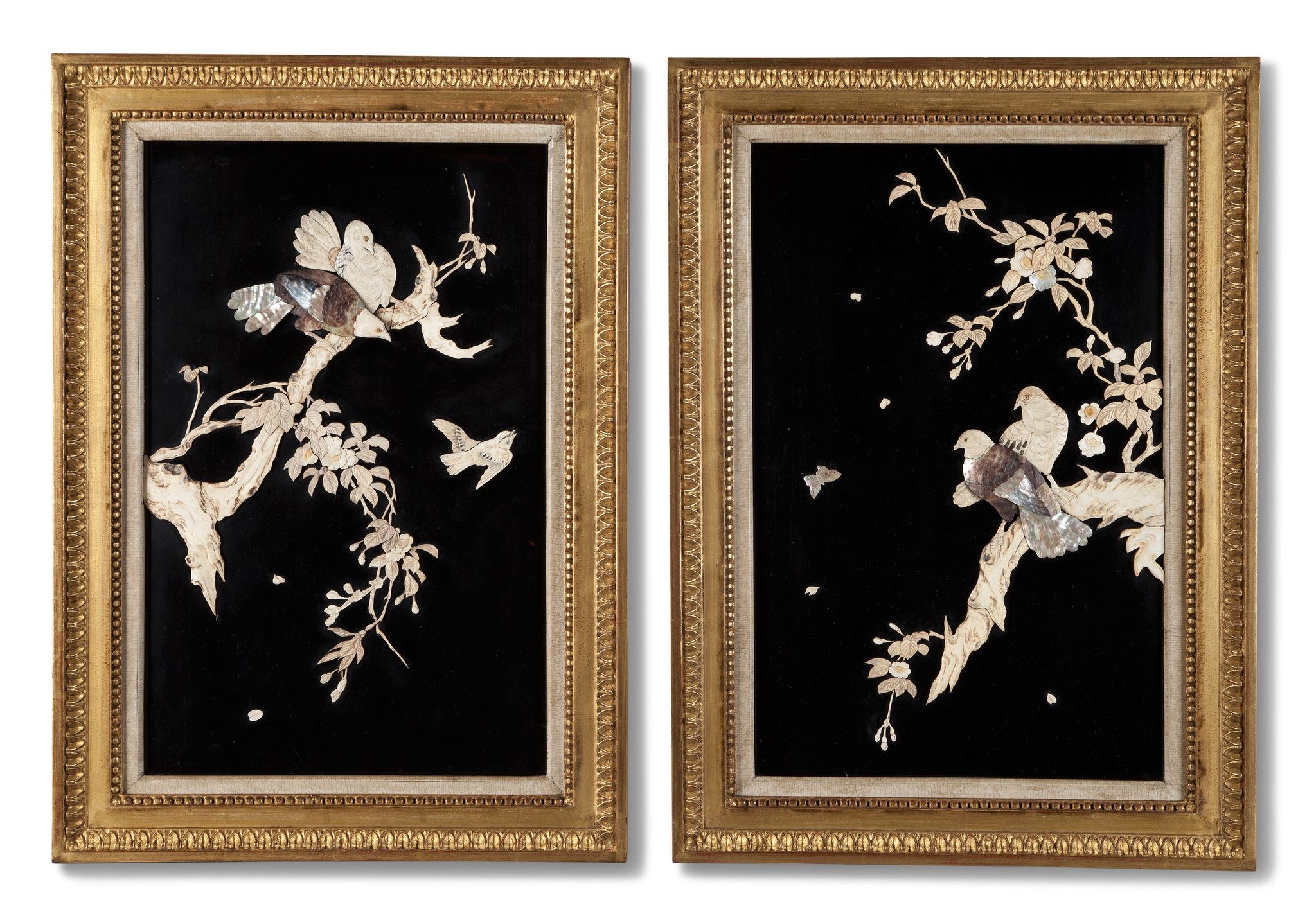 A Pair of Japanese Panels Japan circa 1880, mother of pearl and carved ivory,  with  black lacquer