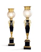 A Pair of Tole and Gilt Bronze Lamps France circa 1830, the vase form columns are flanked by