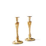 A Pair of Russian Candlesticks Russia circa 1810, with finely turned and crisply cast ornament,