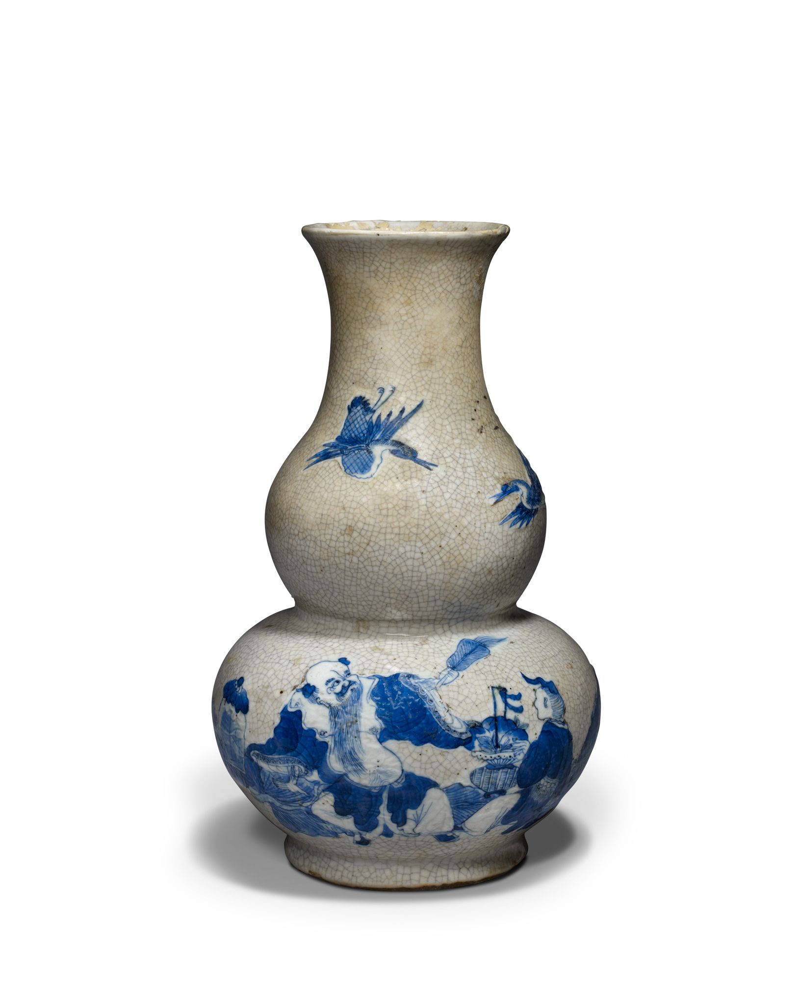 A Gourd Vase China, circa 1850, of double gourd form, decorated in underglaze blue, restored ,