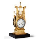 A Charles X Bronze and Ormolu Clock France circa 1820, the dial bordered with cut paste