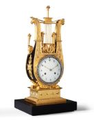 A Charles X Bronze and Ormolu Clock France circa 1820, the dial bordered with cut paste