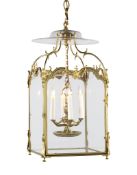 A  Brass Hall Lantern England circa 1820, surmounted by anthemia at each corner and stylised