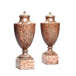 A Pair of Russian Hardstone Urns Russia circa 1810, each supported on a block plinth,   26cm high