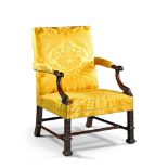A George II Mahogany Library Armchair England circa 1740, the arm supports with stylised acanthus