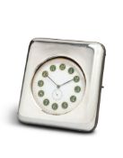 An Enamel Faced Travelling Clock in a Leather and Silver Case England circa 1908, in the form of