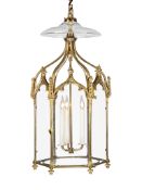 A Regency Brass Gothic Lantern England circa 1810, each face is surmounted by a Gothic ogee arch and