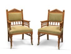 A Pair of Victorian Gothic Revival Armchairs England circa 1840, with carved frames and galleried
