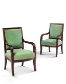A Pair of Empire Mahogany Fauteuils France circa 1810, each with square backs carved with reeding,